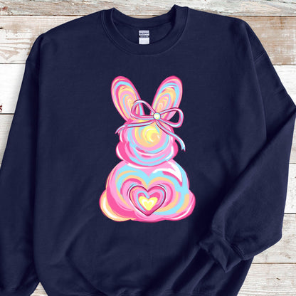 May include: A navy blue sweatshirt with a pink, blue, and yellow swirl design of an Easter bunny with a pink bow and a heart in the center.