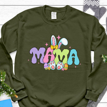 May include: Green sweatshirt with a colorful "MAMA" graphic featuring a bunny with Easter eggs. 