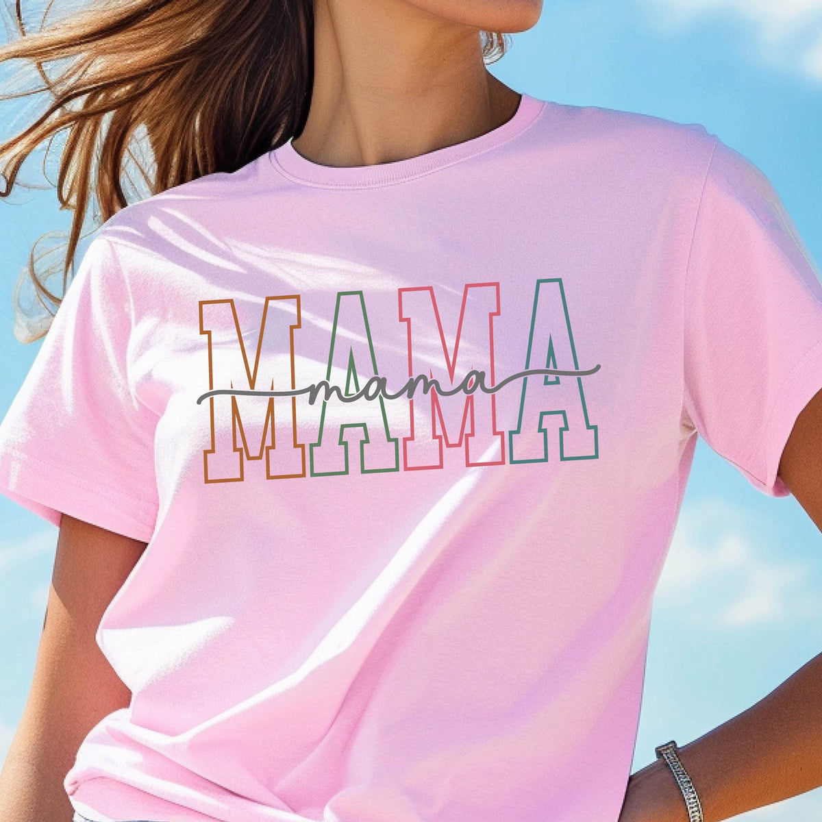 May include: Pink t-shirt with the word "MAMA" in colorful block letters with a handwritten "mama" underneath.