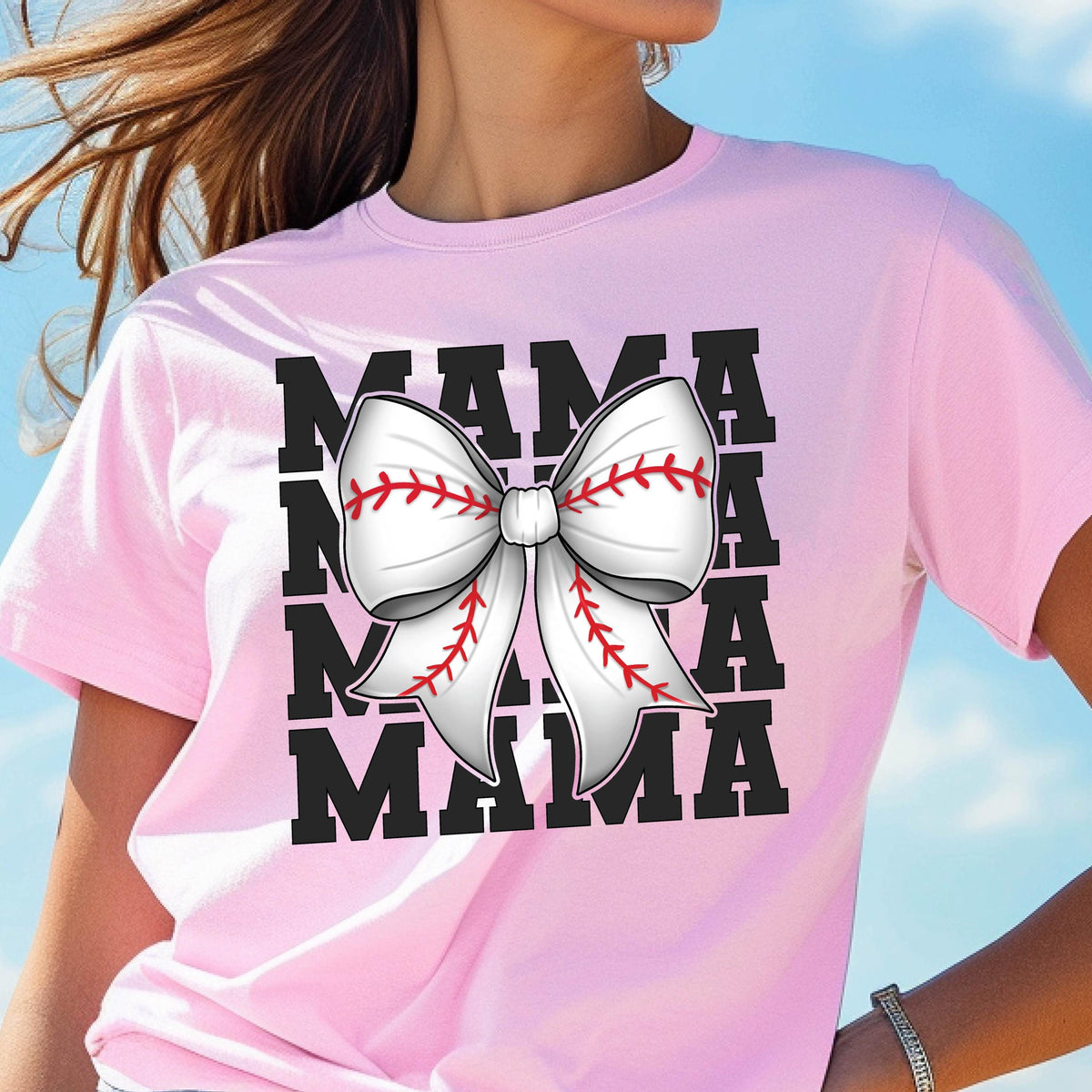 May include: Pink t-shirt with a black graphic of the word "MAMA" repeated three times with a white and red baseball-themed bow in the center.