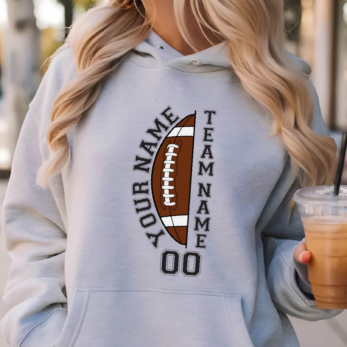 May include: Light gray hoodie with a football graphic. The design includes a brown football with white laces, the words "YOUR NAME" and "TEAM NAME" in black, and the number "00". The hoodie has a drawstring hood.