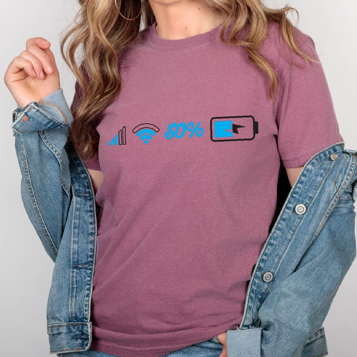 May include: A mauve t-shirt with a graphic of a phone signal, wifi symbol, 50% battery, and a low battery icon.