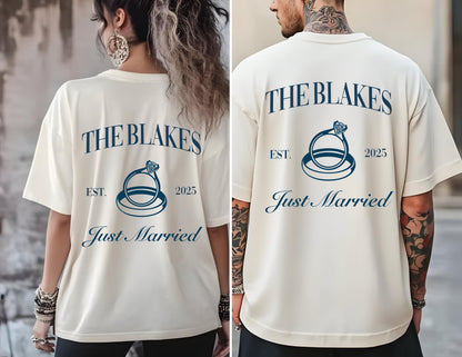 May include: Two white t-shirts with the text "The Blakes Est. 2025 Just Married" and a graphic of two interlocking rings with a diamond. 
