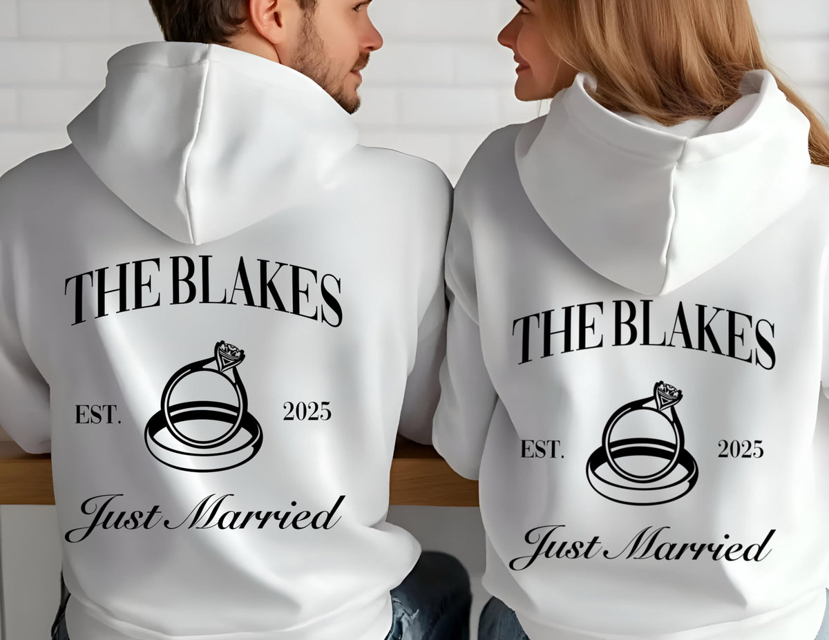 May include: White hoodies with black text and a ring design. The text reads "The Blakes Est. 2025 Just Married".