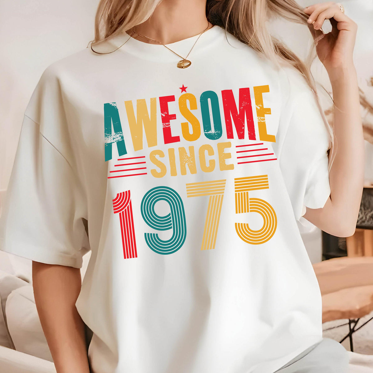 May include: White t-shirt with a vintage-style graphic that says "Awesome Since 1975" in red, yellow, blue, and green.