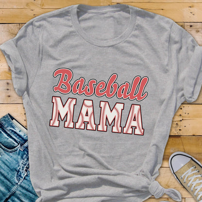 May include: Gray t-shirt with the text "Baseball Mama" in red and white lettering. The word "Mama" is surrounded by a baseball stitch design.