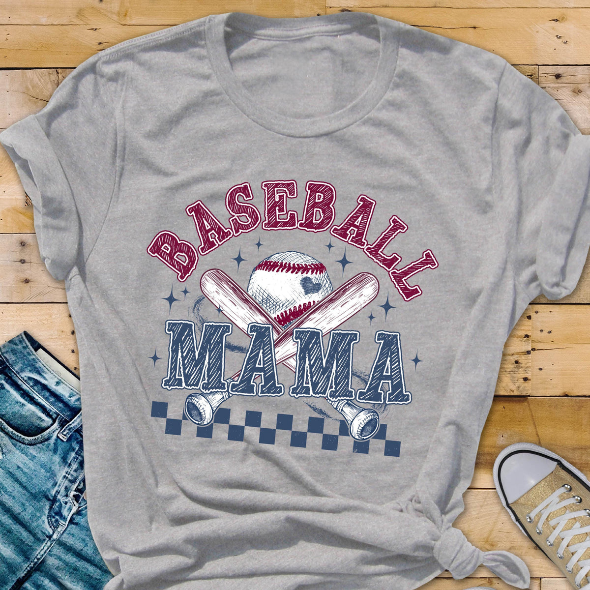 May include: Gray t-shirt with a baseball graphic and the text "Baseball Mama" in blue and red lettering.