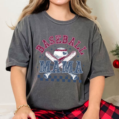 May include: A gray t-shirt with the text "BASEBALL MAMA" in red and blue lettering. A baseball and crossed bats are depicted in the center of the shirt.