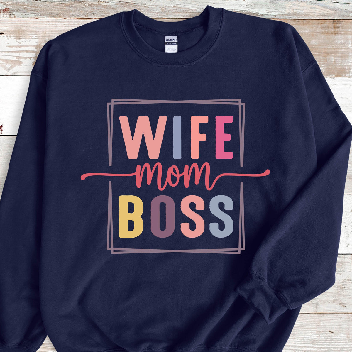 May include: Navy blue sweatshirt with the text "Wife Mom Boss" in a colorful box.