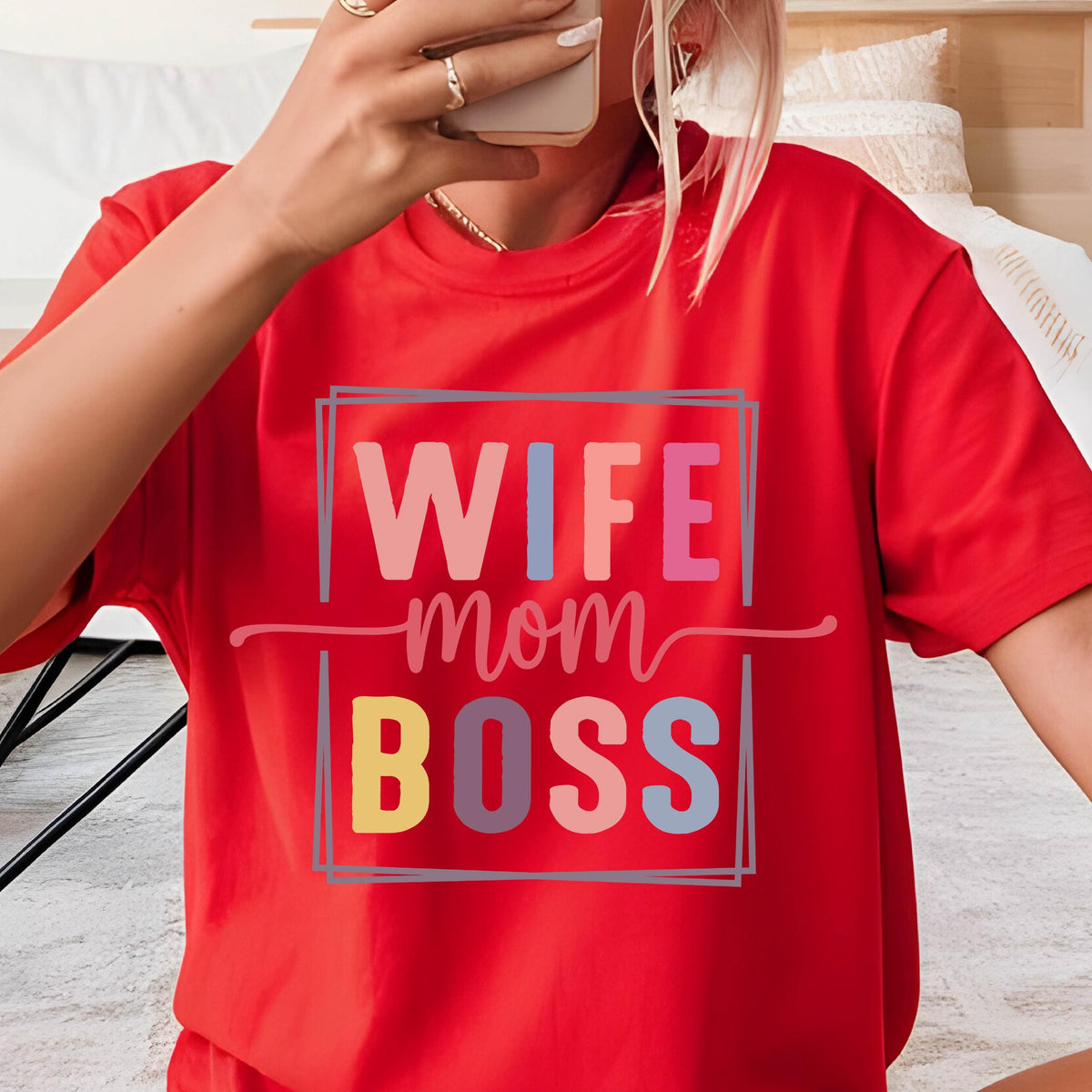 May include: Red t-shirt with a white box around the text "Wife Mom Boss" in colorful letters.