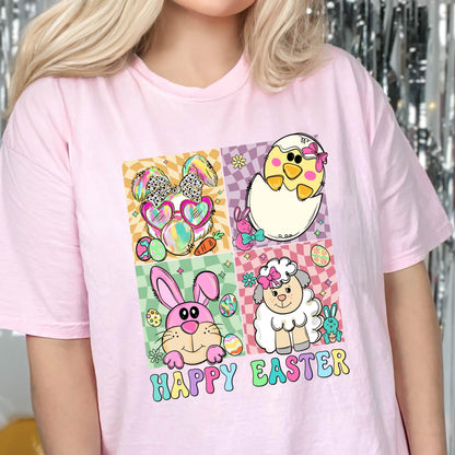 May include: Pink t-shirt with a colorful graphic of Easter animals and eggs. The graphic includes a bunny, a chick, a lamb, and eggs. The text "Happy Easter" is printed below the graphic.