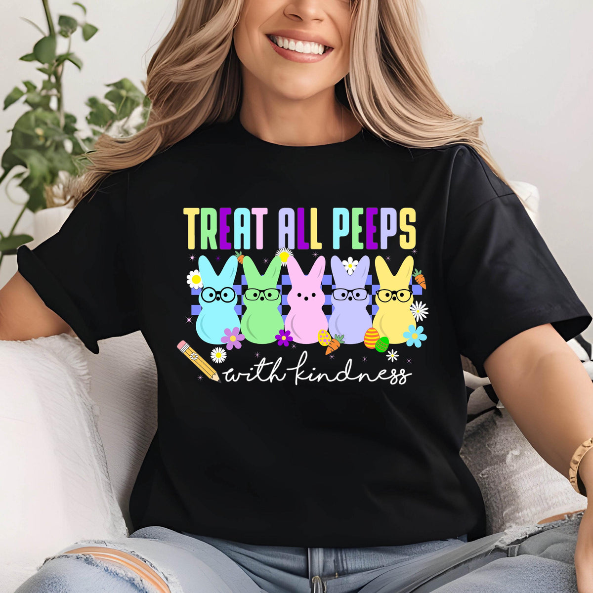 May include: Black t-shirt with a graphic of five colorful Peeps with glasses and the text "Treat all peeps with kindness".