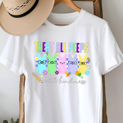 May include: White t-shirt with a graphic of five pastel-colored peeps wearing glasses and the text "Treat all peeps with kindness".
