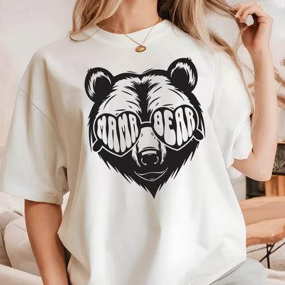 May include: White t-shirt with a black and white illustration of a bear wearing heart-shaped sunglasses that say "Mama Bear".