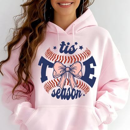 May include: Pink hoodie with a baseball graphic and the text "tis the season" in blue and red.