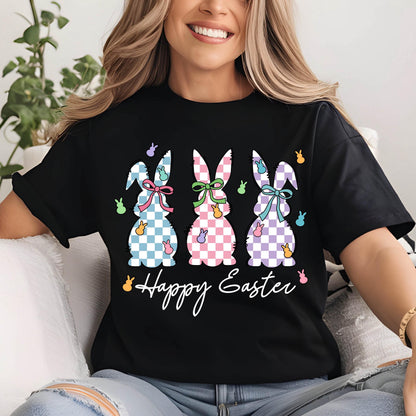 May include: Black t-shirt with a graphic of three pastel checkered Easter bunnies and the text "Happy Easter".