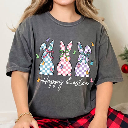 May include: A gray t-shirt with a graphic of three checkered Easter bunnies and the text "Happy Easter".