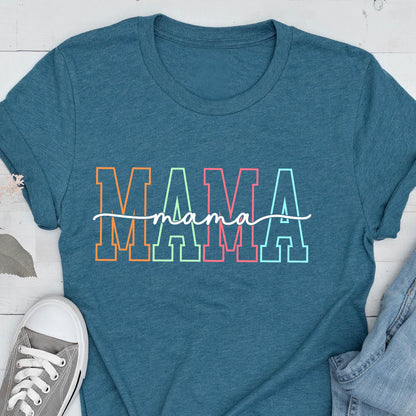 May include: A teal blue t-shirt with the word "MAMA" in rainbow colors with a white script "mama" underneath.