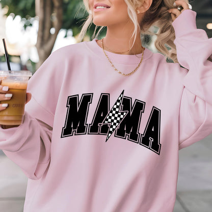 May include: Pink sweatshirt with a black and white checkered lightning bolt graphic and the word "MAMA" in black block letters.