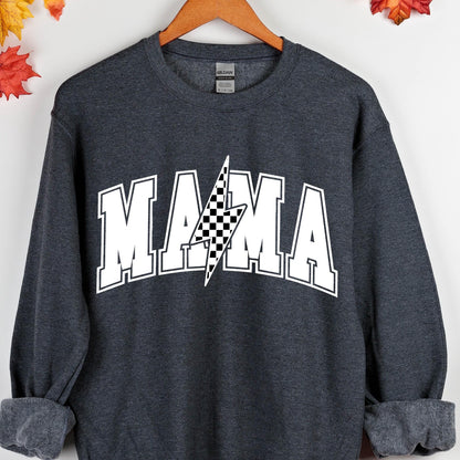 May include: A dark gray sweatshirt with the word "MAMA" in white letters with a black and white checkered lightning bolt in the center.