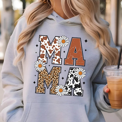 May include: Gray hooded sweatshirt with the word "MAMA" printed in large letters. The letters are decorated with cow print, leopard print, and floral designs.