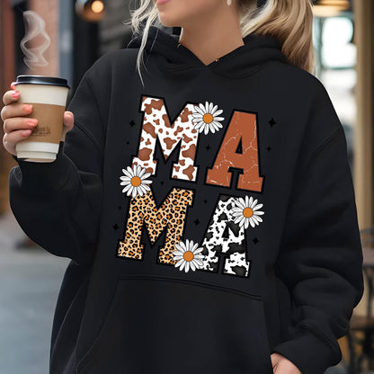 May include: Black hoodie with a graphic print of the word "MAMA" in large letters. The letters are decorated with cow print, leopard print, and daisy patterns.
