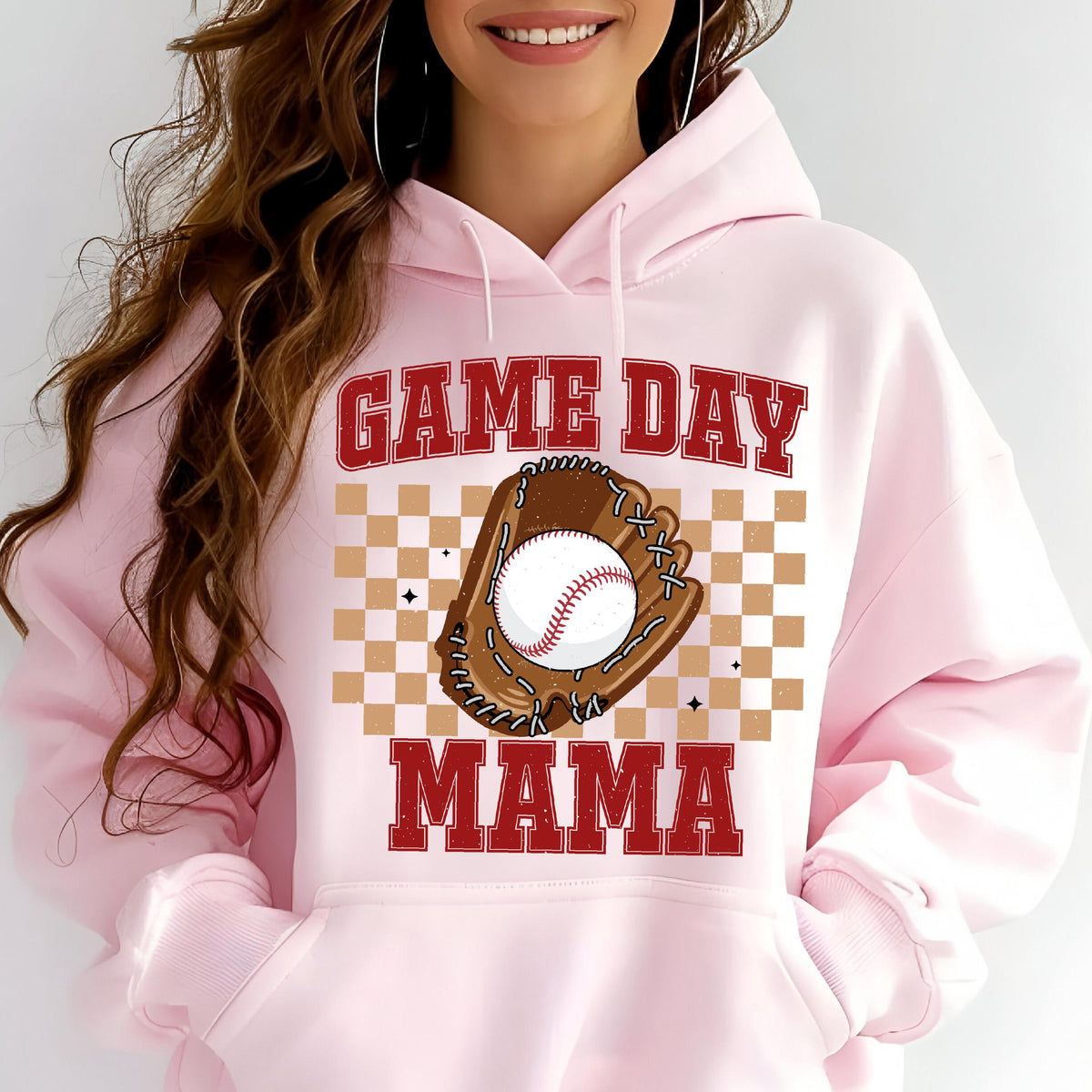 May include: Pink hooded sweatshirt with a baseball glove and ball graphic and the text "GAME DAY MAMA" in red.