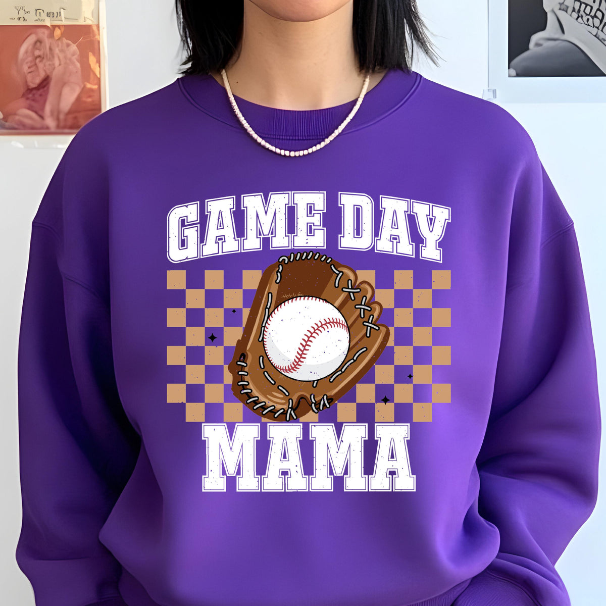 May include: Purple sweatshirt with a white graphic that says "GAME DAY MAMA" with a baseball and glove illustration.
