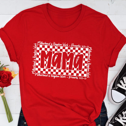 May include: Red t-shirt with a white checkered background and the word "Mama" in white letters. The text "Motherhood is Kingdom Work - Proverbs 3:25-27" is repeated on the top and bottom of the checkered background.