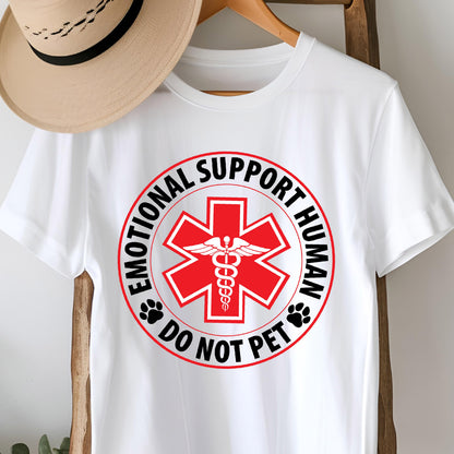 May include: White t-shirt with a red and black graphic. The graphic is a circular design with the words "EMOTIONAL SUPPORT HUMAN" and "DO NOT PET" surrounding a red medical symbol with a caduceus in the center. Paw prints are on either side.