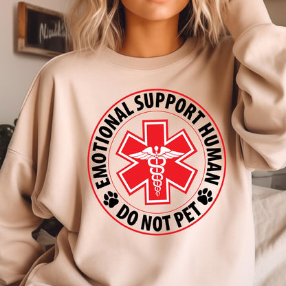May include: A beige sweatshirt with a red medical symbol and the text "Emotional Support Human Do Not Pet" in a black circle.