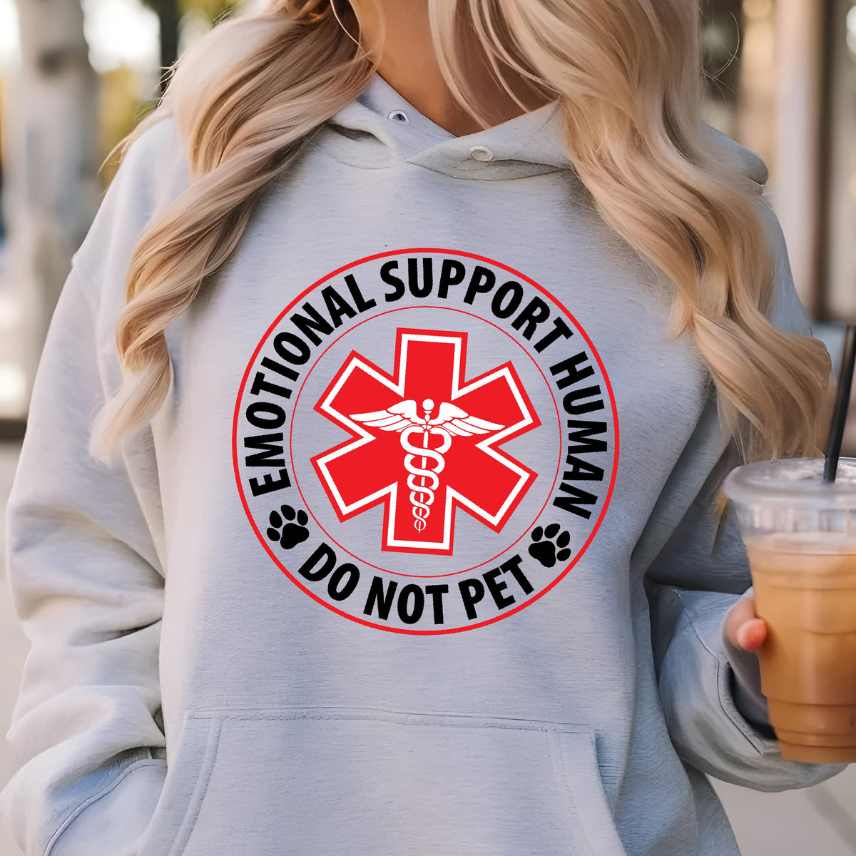 May include: A gray hoodie with a black circle graphic that says "Emotional Support Human Do Not Pet" with a red medical symbol in the center.