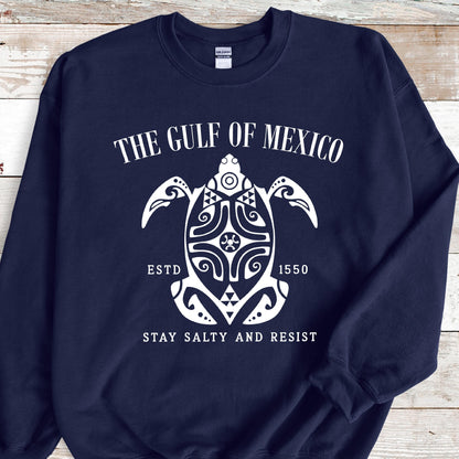 May include: Navy blue sweatshirt with a white graphic of a stylized turtle with the text "The Gulf of Mexico, Est. 1550, Stay Salty and Resist".