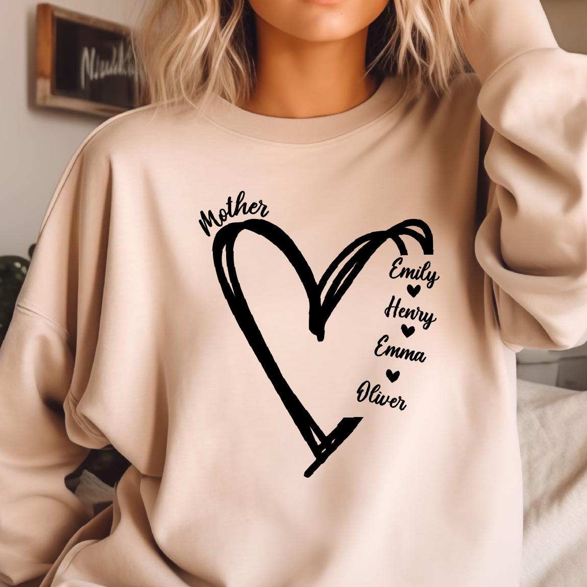 May include: A beige sweatshirt with a black heart design and the word "Mother" above it. Inside the heart are the names "Emily", "Henry", "Emma", and "Oliver" with a small heart symbol next to each name.