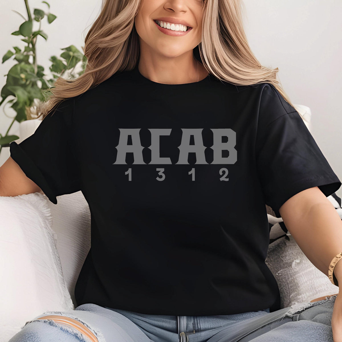 May include: Black t-shirt with the text "ACAB 1312" printed in gray.