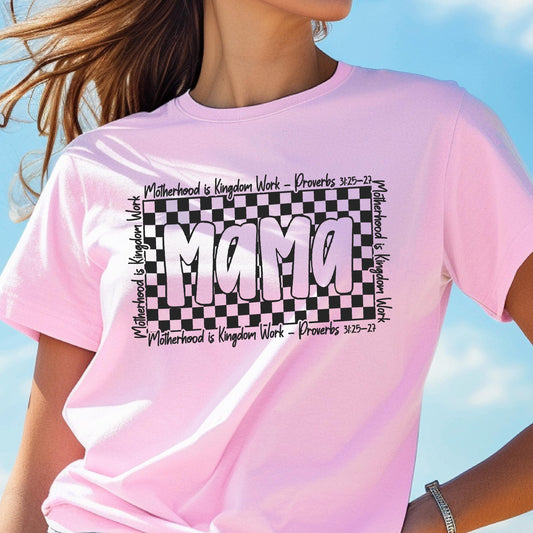 May include: Pink t-shirt with a black and white checkered design and the word "Mama" in a pink and white gradient. The text "Motherhood is Kingdom Work - Proverbs 3:25-27" is repeated around the checkered design.