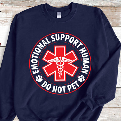 May include: Navy blue sweatshirt with a white circle graphic that says "Emotional Support Human Do Not Pet" with a red medical symbol in the center.