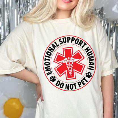 May include: White t-shirt with a red and black circle graphic that says "Emotional Support Human Do Not Pet" with a red medical symbol and a snake inside.
