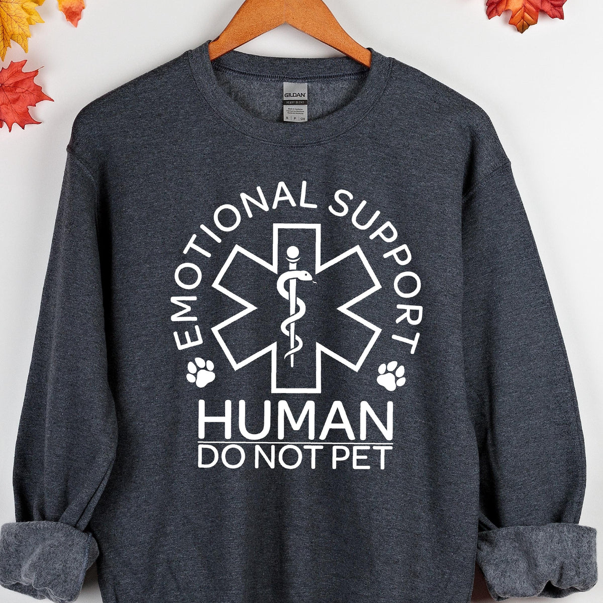 May include: A dark gray sweatshirt with a white graphic of a medical symbol with a snake and the text "Emotional Support Human Do Not Pet".