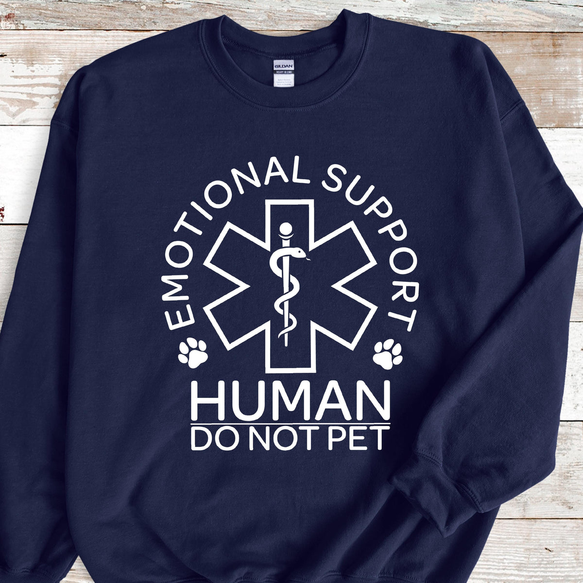 May include: Navy blue sweatshirt with a white graphic of a medical symbol, paw prints, and the text "Emotional Support Human Do Not Pet".