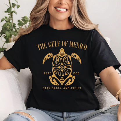 May include: Black t-shirt with a gold graphic of a turtle with the text "The Gulf of Mexico" above it, "Estd 1550" below the turtle, and "Stay Salty and Resist" at the bottom.