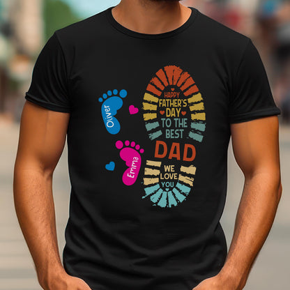 May include: Black t-shirt with a colorful graphic for Father's Day. The design includes a footprint, hearts, and the text "Happy Father's Day to the Best Dad." The names "Oliver" and "Emma" are also included.