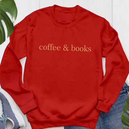 May include: Red long-sleeved sweatshirt with the text "coffee & books" in orange.