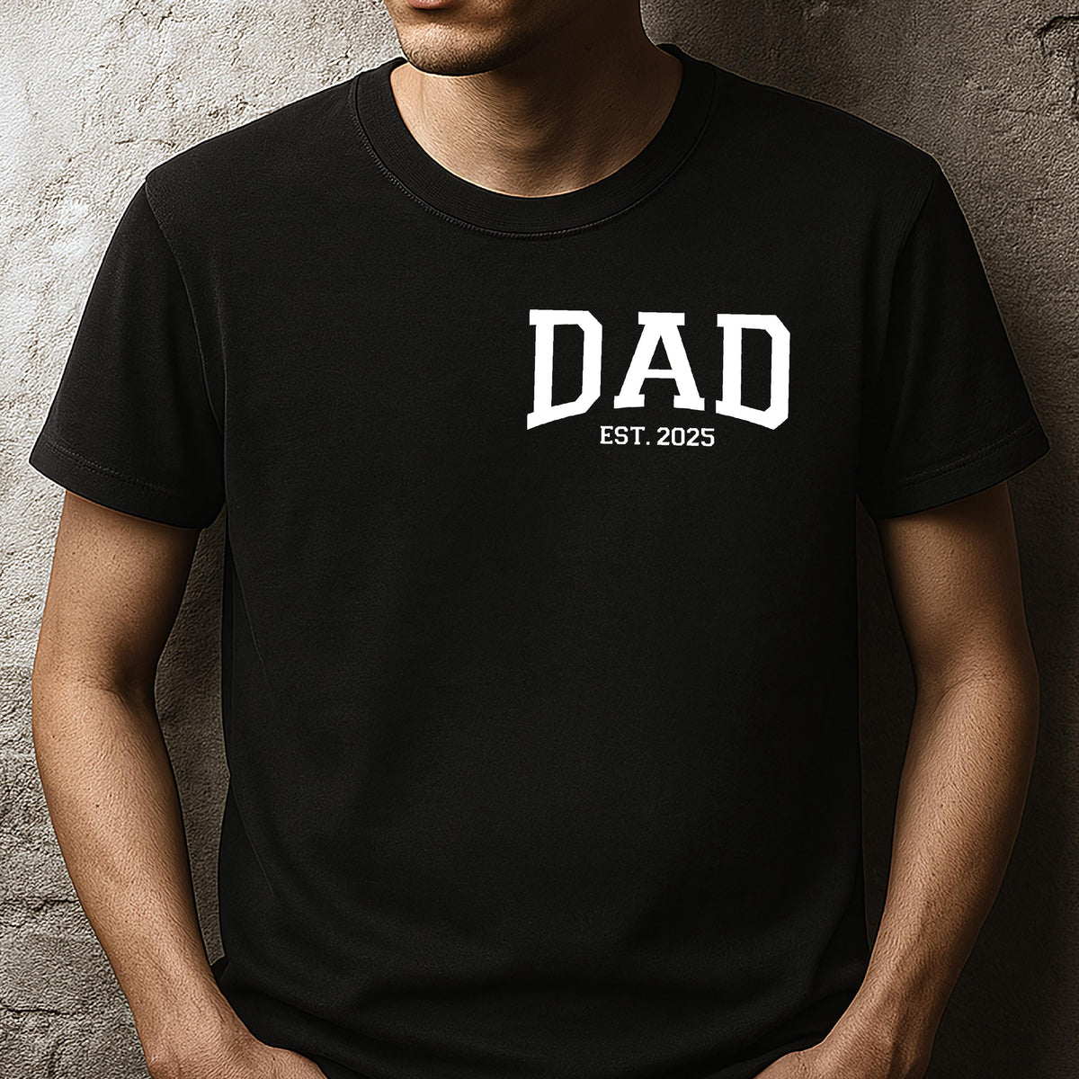 May include: Black t-shirt with white text that reads "DAD EST. 2025".