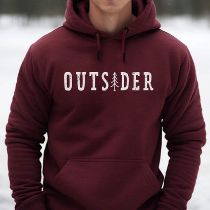 May include: A maroon hooded sweatshirt featuring a white distressed graphic on the chest that reads OUTSIDER, with a stylized pine tree replacing the letter I. The garment includes a front kangaroo pocket and matching maroon drawstrings.