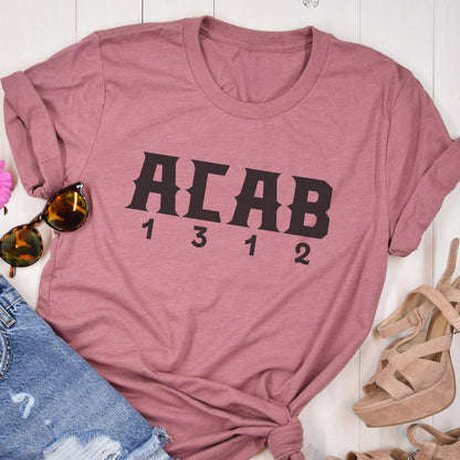 May include: A pink t-shirt with the text "ACAB 1312" printed in black.