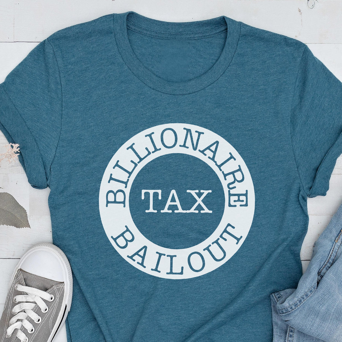 May include: A teal blue t-shirt with a white circle graphic that says "Billionaire Tax Bailout".