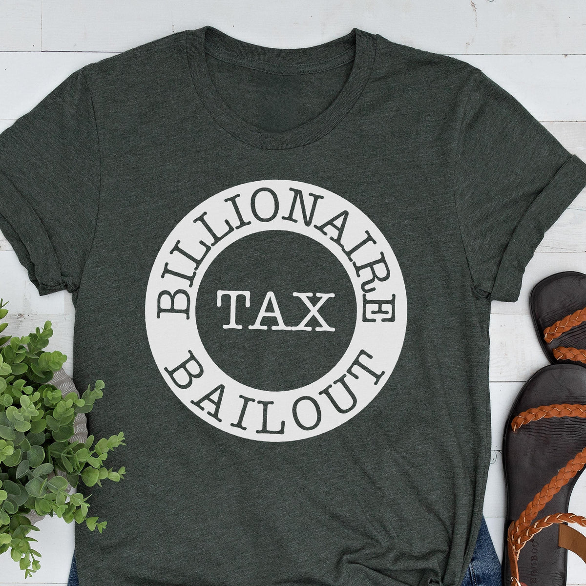 May include: A dark green t-shirt with a white circle graphic that says "Billionaire Tax Bailout".