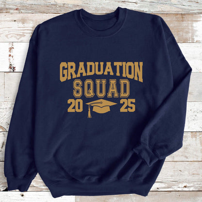 May include: Navy blue sweatshirt with the words "GRADUATION SQUAD" in gold lettering. Below the text are the numbers "20" and "25" with a graduation cap in between. A comfortable crew neck sweatshirt for graduation.