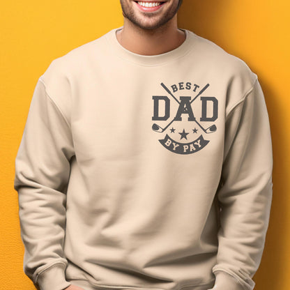 May include: Beige sweatshirt with a graphic that says "BEST DAD BY PAY" in dark gray. The design includes crossed golf clubs and stars. The sweatshirt is a neutral color.